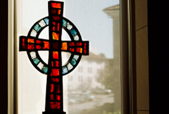 Candler School of Theology | Stained glass cross in window
