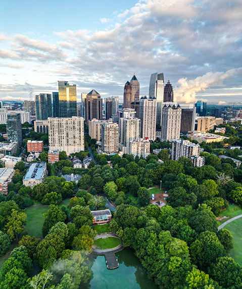 aerial shot of Atlanta, Ga, with trees and cityscape