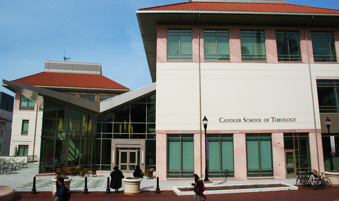 modern building with red clay tile roof and logo of Candler School of Theology